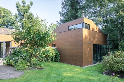 Ancient monastery wall slices through Utrecht house extension
