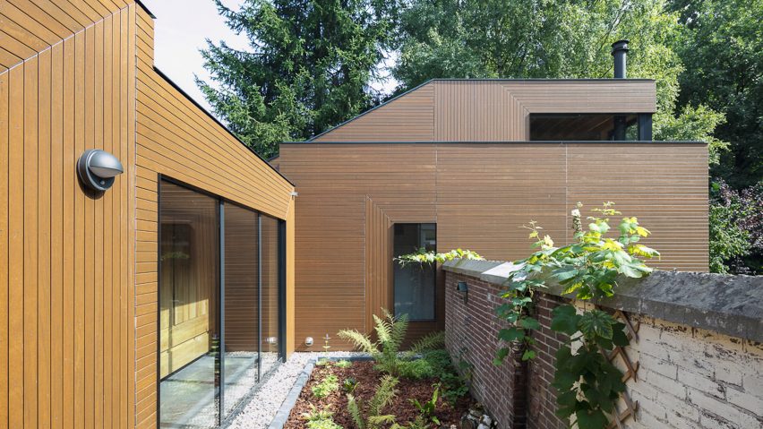 Ancient monastery wall slices through Utrecht house extension