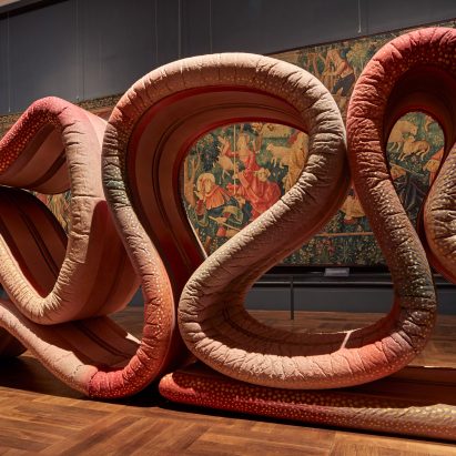 Ross Lovegrove installs 21-metre-long fabric snake in V&A tapestry room
