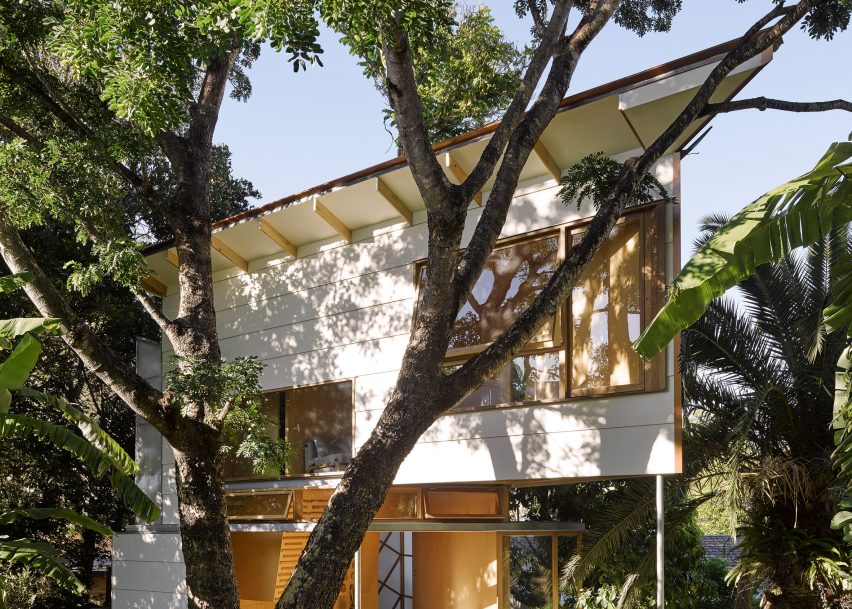Extremely pointed garden room features a treehouse-like design and a climbing wall