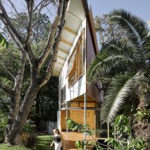 Extremely pointed garden room features a treehouse-like design and a climbing wall