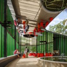 Mirrored ceilings reflect surroundings along walkway installed at Australian university campus