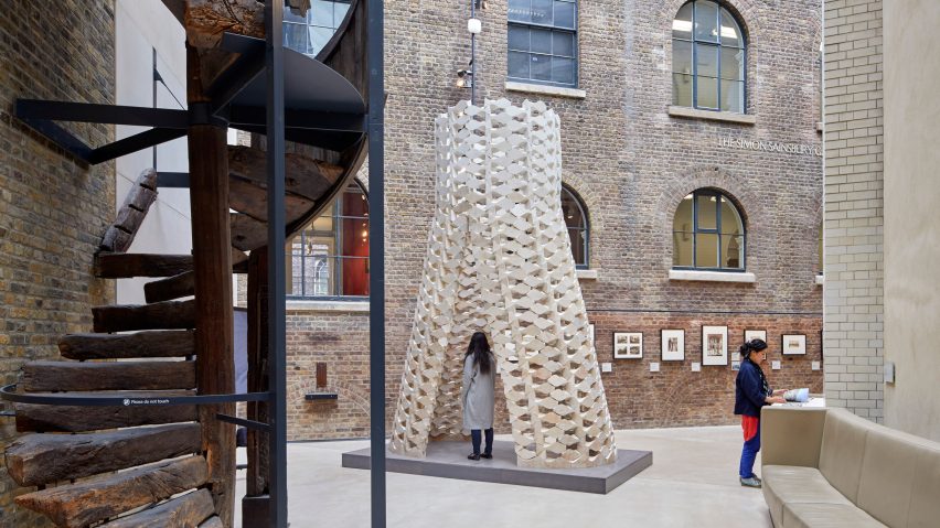 AAU Anastas stacks robotically cut stone blocks into tower at V&A