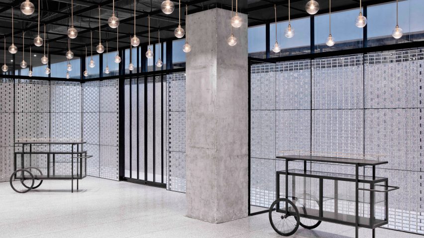 Neri&Hu uses translucent glass blocks for walls of bright and flexible function room in Beijing