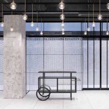 Neri&Hu uses translucent glass blocks for walls of bright and flexible function room in Beijing