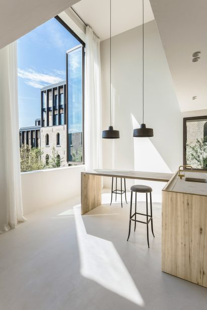 The apartment designed by interior architect Arjaan De Feyter is located within one of four new-build blocks called The Cube, which were developed by Brussels-based architecture firm Bogdan & Van Broeck.