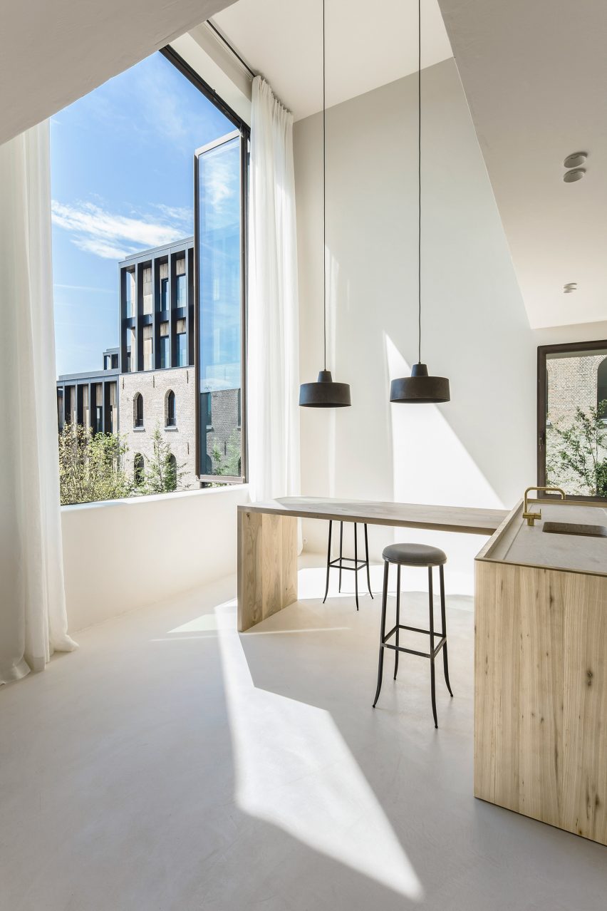 The apartment designed by interior architect Arjaan De Feyter is located within one of four new-build blocks called The Cube, which were developed by Brussels-based architecture firm Bogdan & Van Broeck.