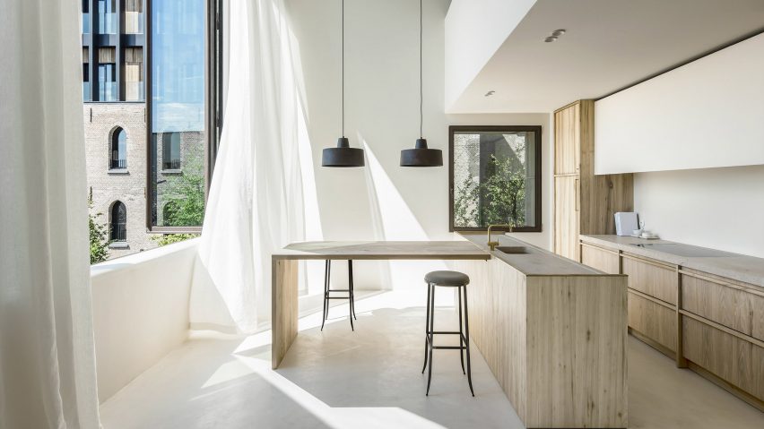 The apartment designed by interior architect Arjaan De Feyter is located within one of four new-build blocks called The Cube, which were developed by Brussels-based architecture firm Bogdan & Van Broeck.