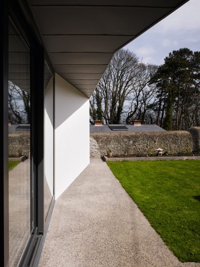 Zinc-clad vaulted roof tops extension to coastal house in Dublin by Arigho Larmour Wheeler