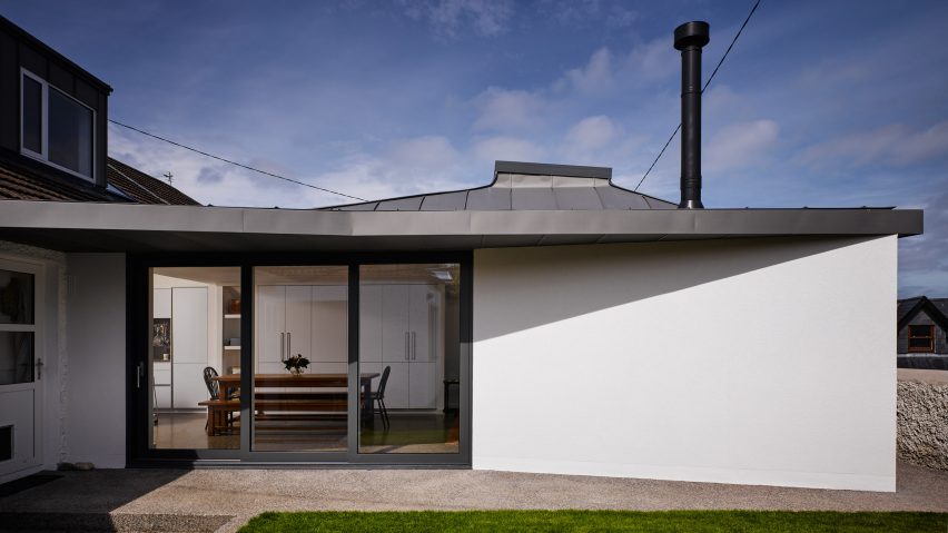 Zinc-clad vaulted roof tops extension to coastal house in Dublin by Arigho Larmour Wheeler