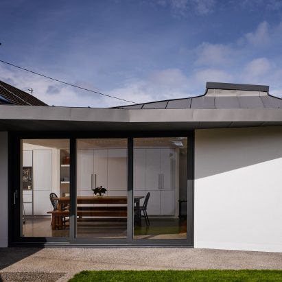 Zinc-clad vaulted roof tops extension to coastal house in Dublin by Arigho Larmour Wheeler