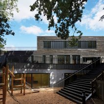 School extension by DSDHA features rough-edged timber cladding and outdoor learning spaces