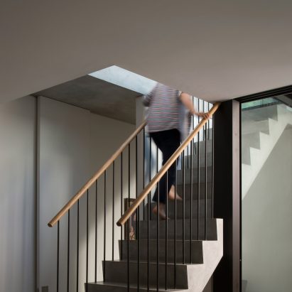 Pre-cast concrete staircase forms centrepiece of basement extension by Studio Octopi