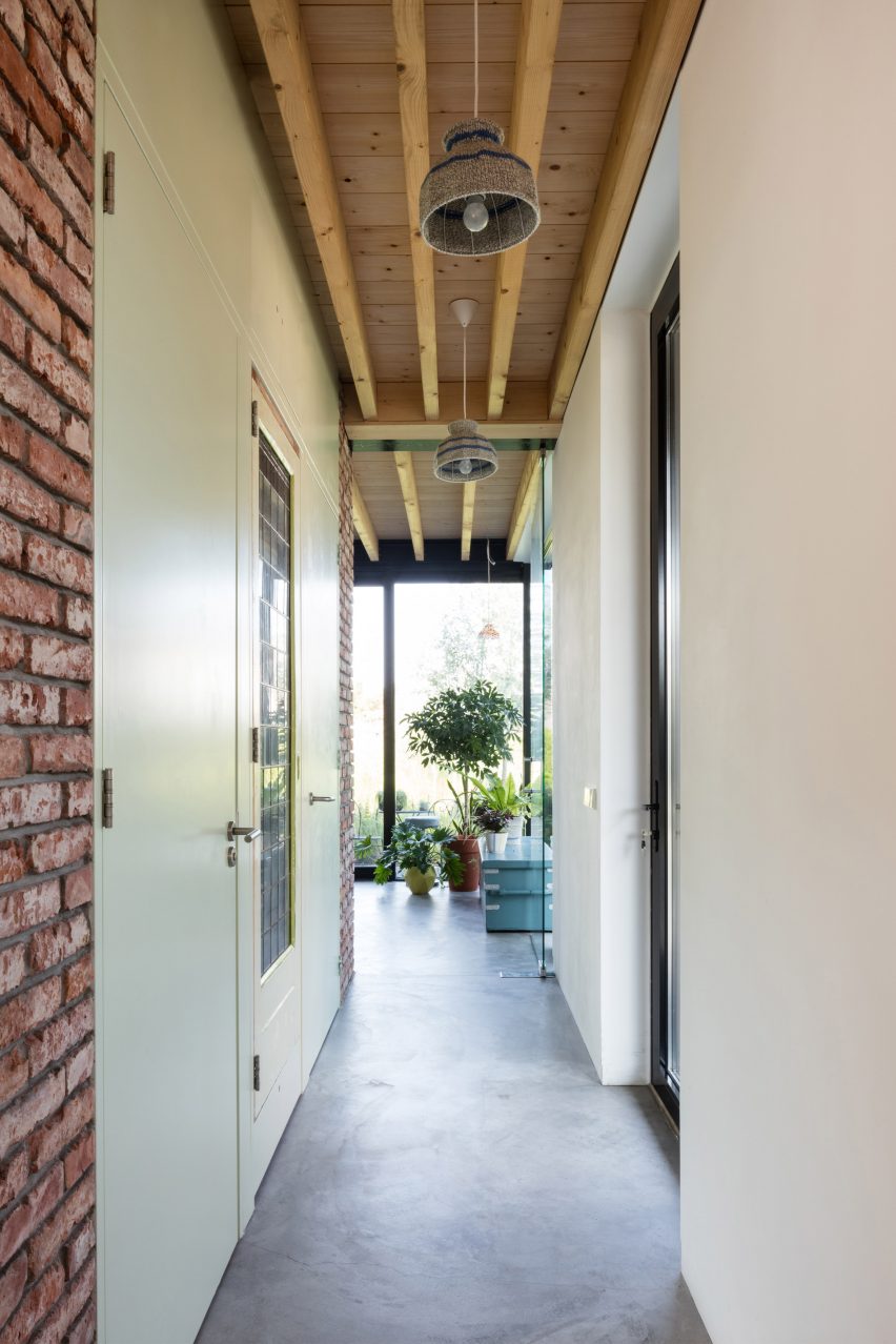 Dutch architect Chris Collaris has completed a house in Amsterdam clad entirely in blackened timber and featuring an asymmetric gabled roof.