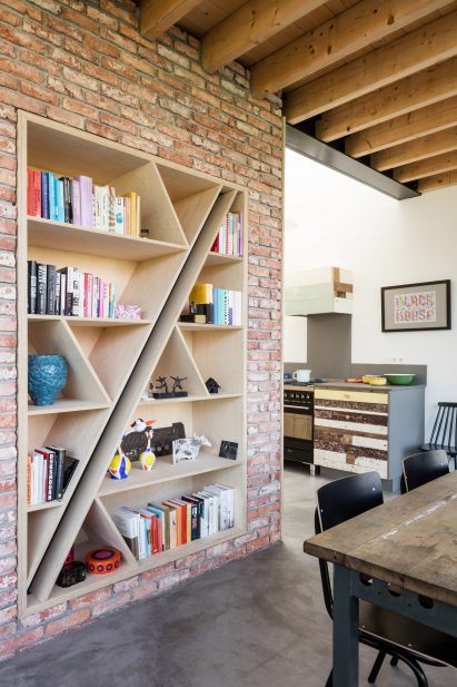 Dutch architect Chris Collaris has completed a house in Amsterdam clad entirely in blackened timber and featuring an asymmetric gabled roof.