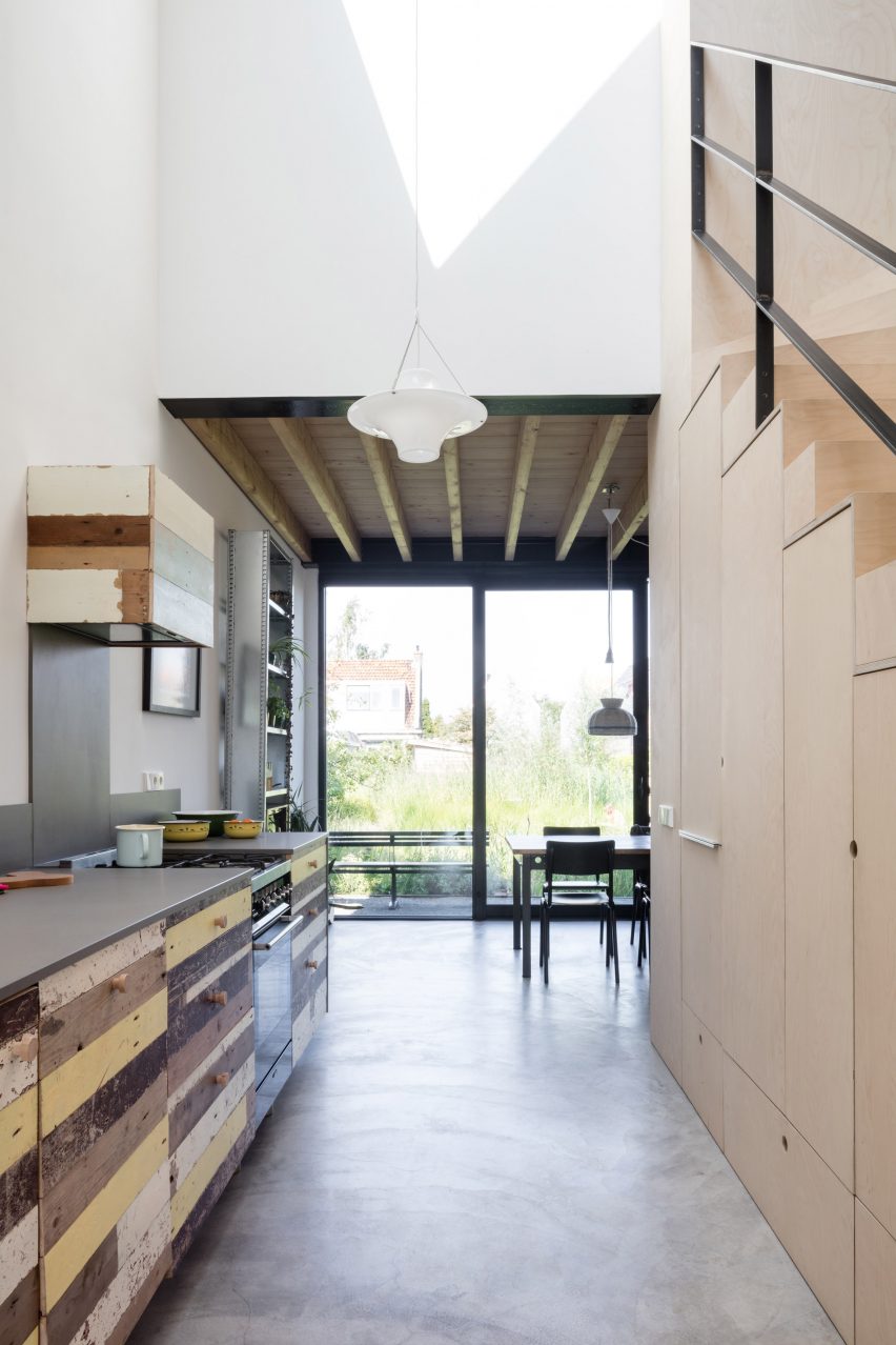 Dutch architect Chris Collaris has completed a house in Amsterdam clad entirely in blackened timber and featuring an asymmetric gabled roof.