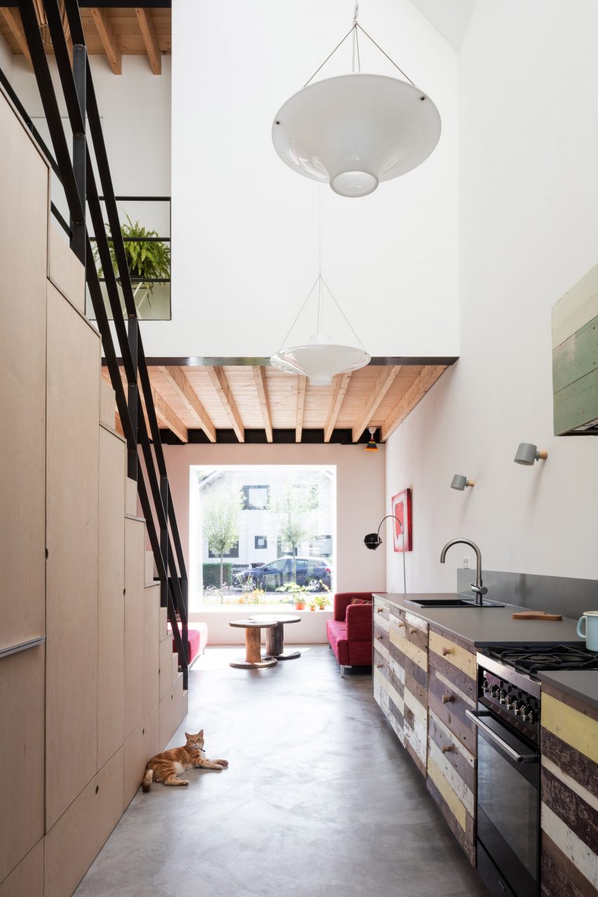 Dutch architect Chris Collaris has completed a house in Amsterdam clad entirely in blackened timber and featuring an asymmetric gabled roof.