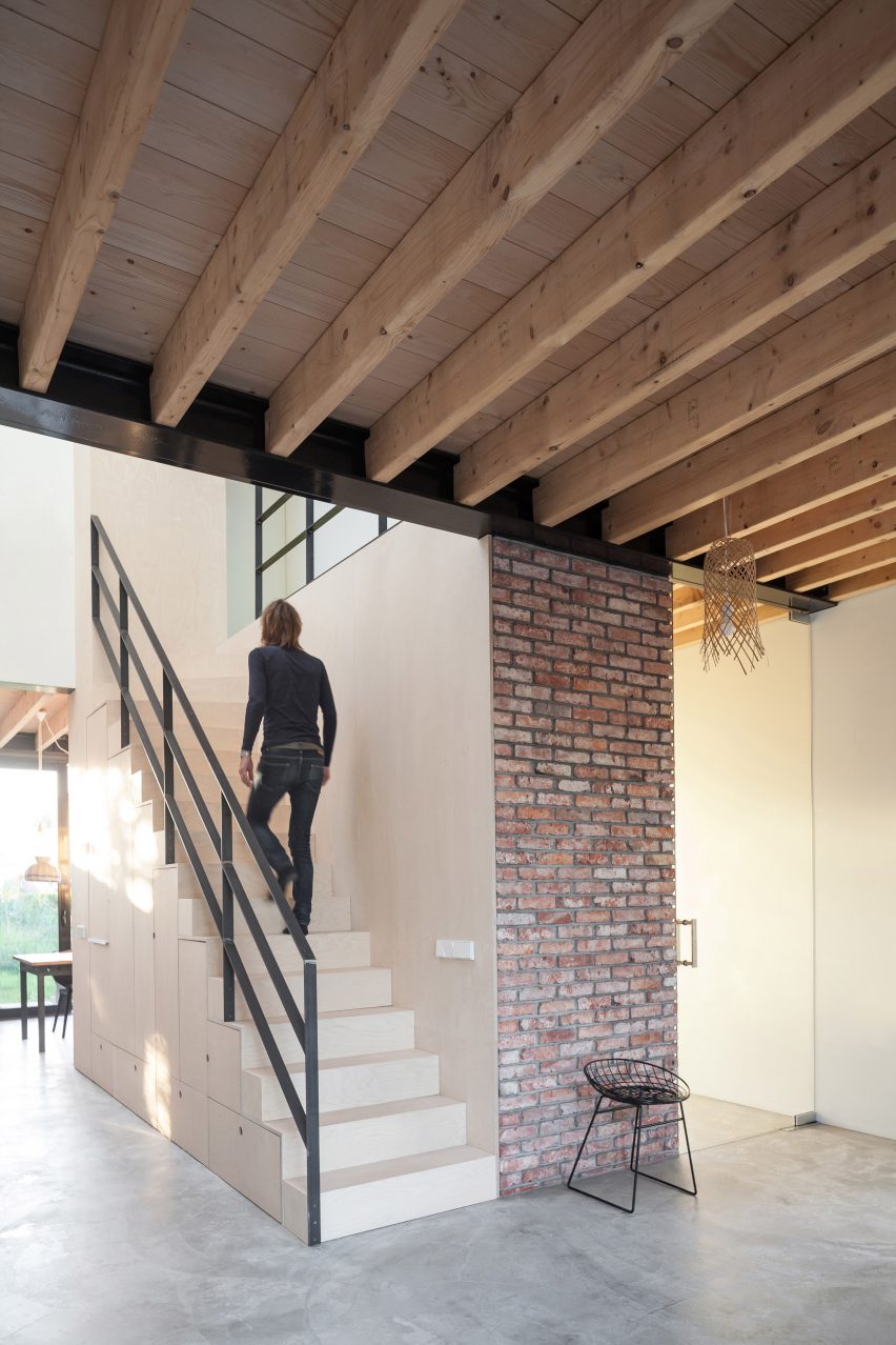 Dutch architect Chris Collaris has completed a house in Amsterdam clad entirely in blackened timber and featuring an asymmetric gabled roof.
