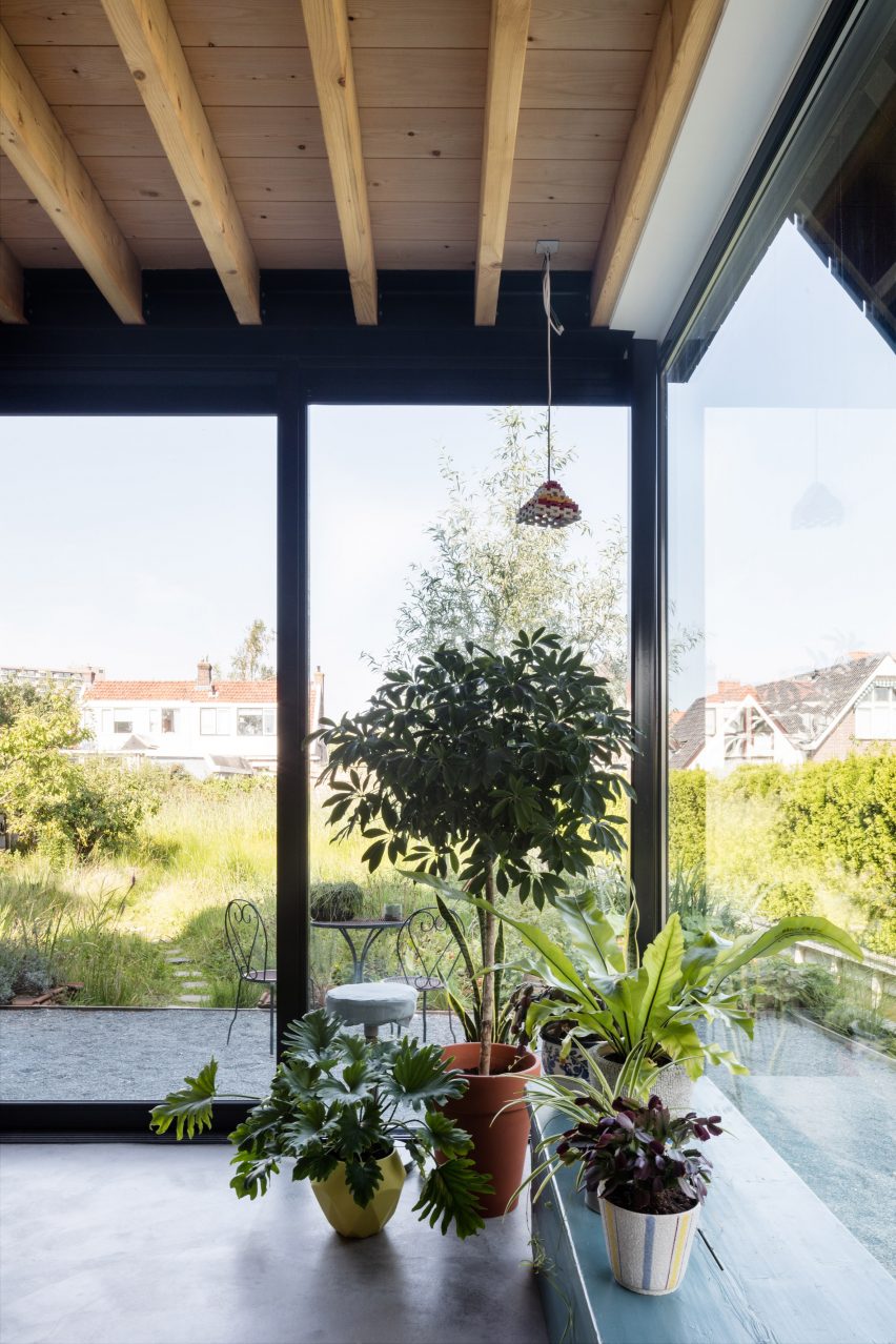 Dutch architect Chris Collaris has completed a house in Amsterdam clad entirely in blackened timber and featuring an asymmetric gabled roof.