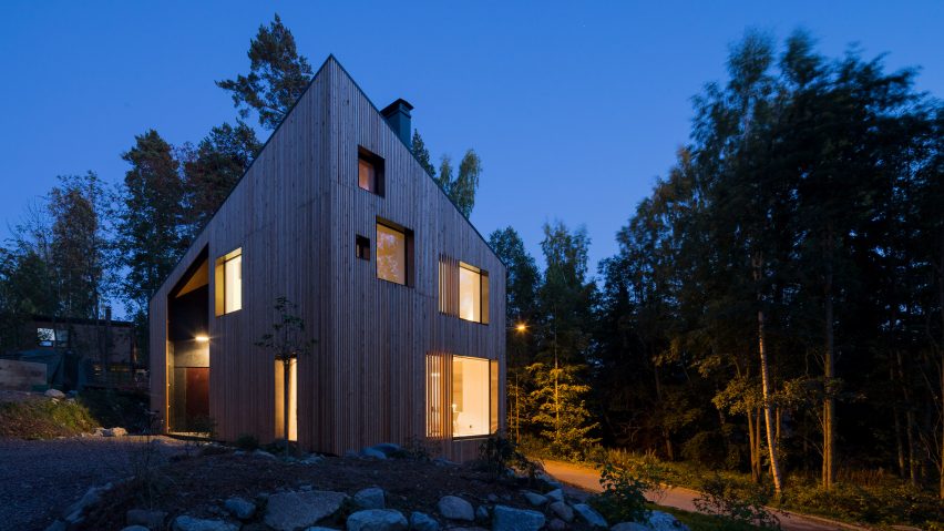 Ortraum Architects builds forest home in Finland with a trapeze, a climbing wall and a hammock
