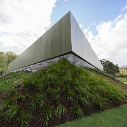Drone footage showcases “floating” roof of OMA’s MPavilion