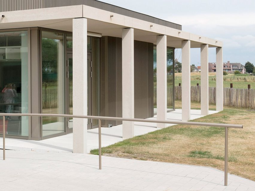 NL Architects completes Belgian school featuring low-lying rooms surrounded by a colonnade