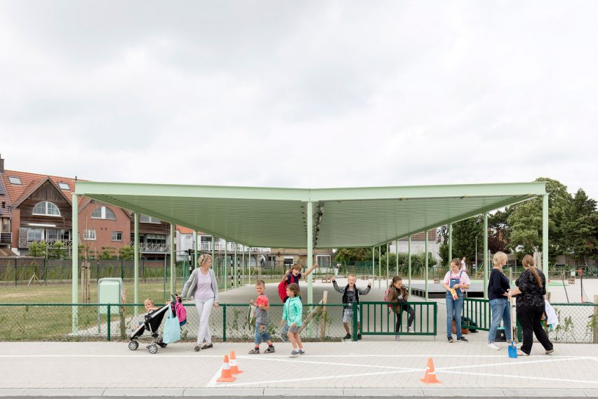 NL Architects completes Belgian school featuring low-lying rooms surrounded by a colonnade