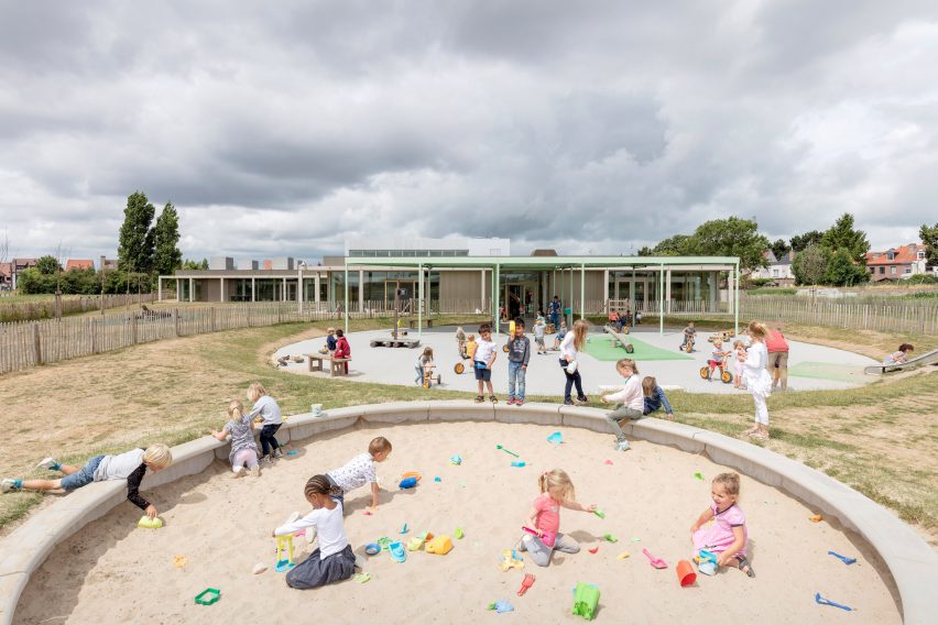 NL Architects completes Belgian school featuring low-lying rooms surrounded by a colonnade