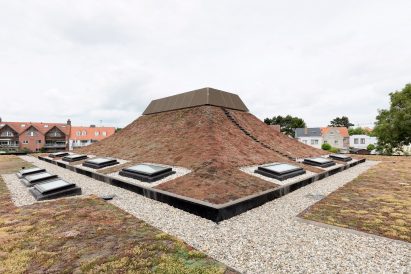 NL Architects completes Belgian school featuring low-lying rooms surrounded by a colonnade