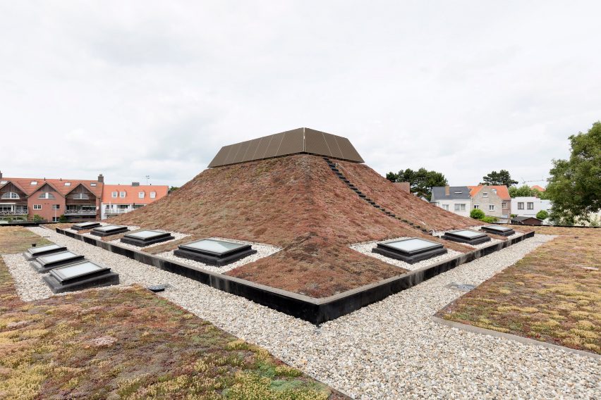 NL Architects completes Belgian school featuring low-lying rooms surrounded by a colonnade