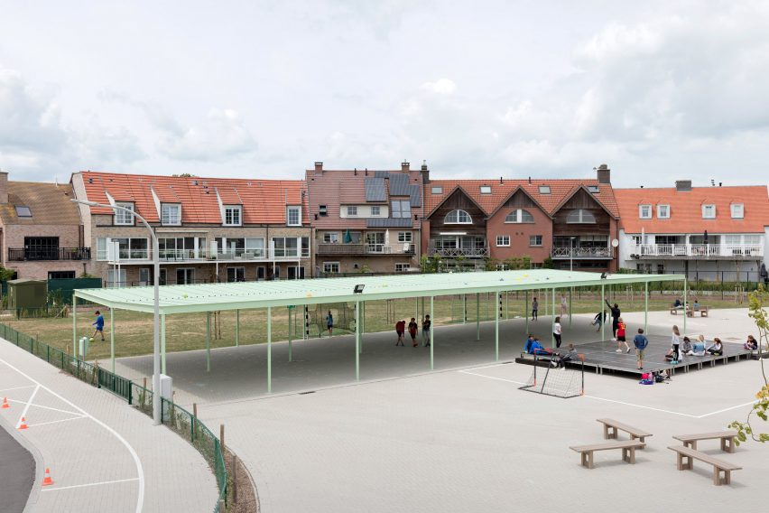 NL Architects completes Belgian school featuring low-lying rooms surrounded by a colonnade