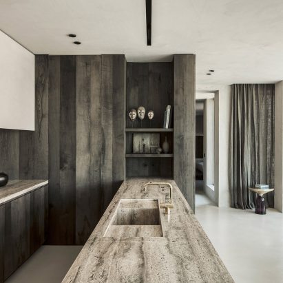 Arjaan De Feyter creates round monochrome living spaces in former silo building near Antwerp