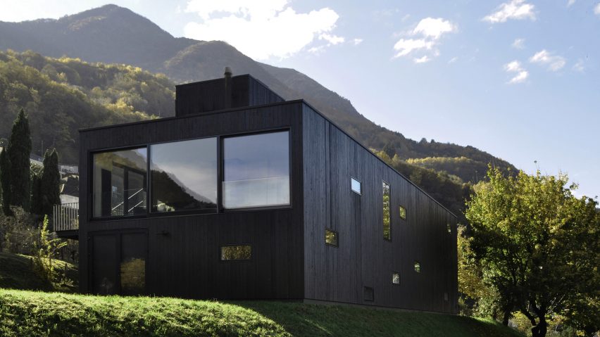 THEWOODBUILDING is a prefabricated wooden holiday home clad in charred timber boards by designers Nicole Lachelle and Christian Niessen