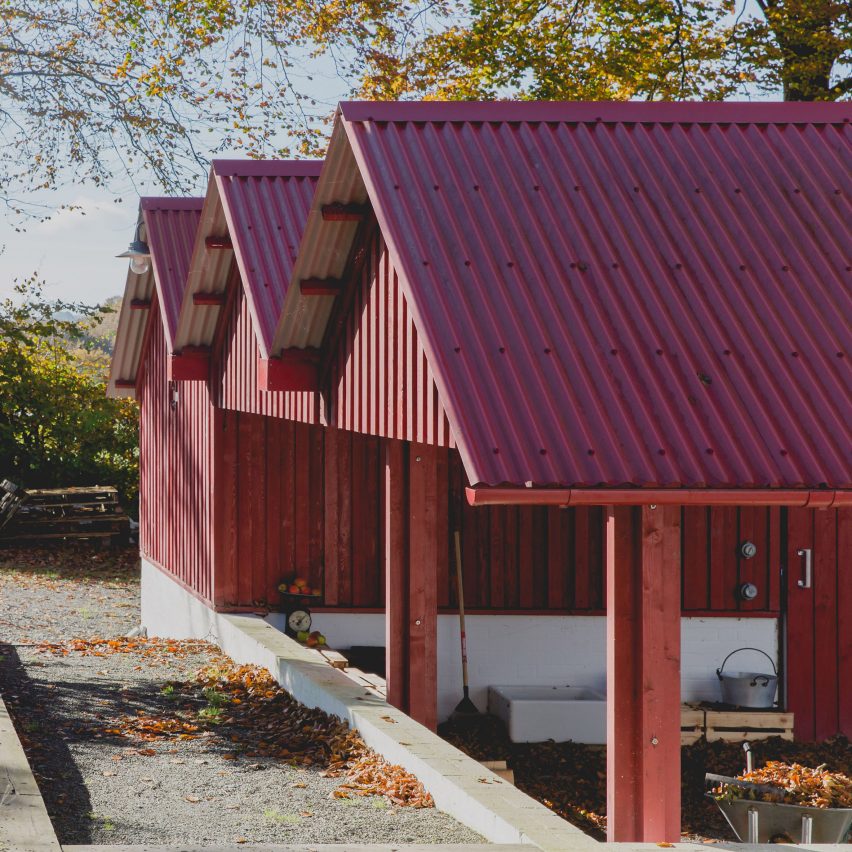 Rural Office for Architecture adds row of red gabled sheds to rural Welsh property