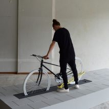 Milou Bergs’ bicycle rack disappears into the pavement when not in use