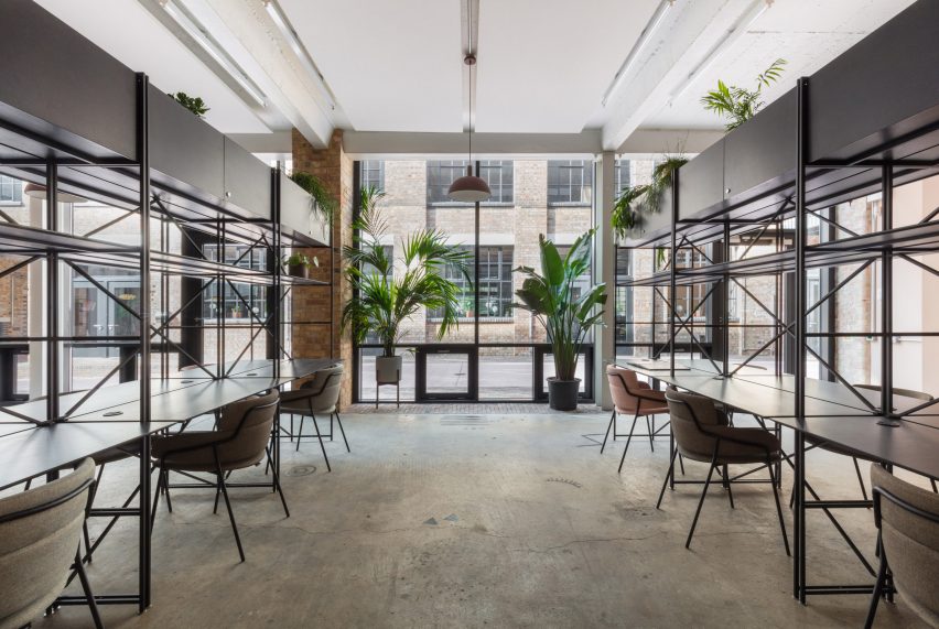 The smooth surface and soft-pink hue of a newly plastered wall provided the starting point for the design of communal spaces at this new creative hub in east London by local studio Sella Concept.