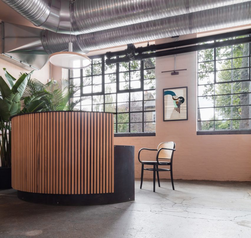 The smooth surface and soft-pink hue of a newly plastered wall provided the starting point for the design of communal spaces at this new creative hub in east London by local studio Sella Concept.