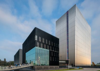 Benthem Crouwel adds stripy tower surrounded by a moat to Amsterdam data centre