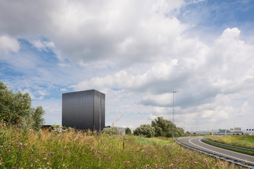 Benthem Crouwel adds stripy tower surrounded by a moat to Amsterdam data centre