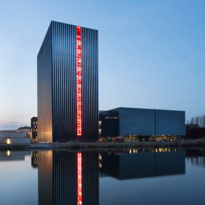 Benthem Crouwel adds stripy tower surrounded by a moat to Amsterdam data centre