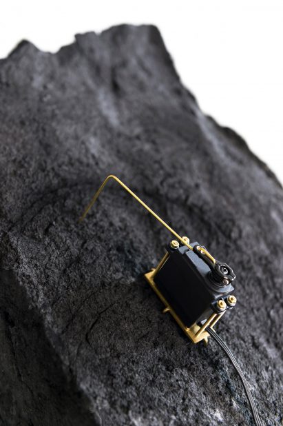 Design Academy Eindhoven graduate Fujita Keisuke has made an installation that uses real-time suicide Tweets to send mechanical signals across to a block of solid carbon