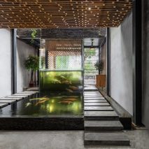 Hanoi cafe features indoor waterfalls, koi-carp ponds and an aquaponics vegetable patch