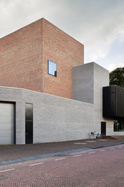 Amsterdam studio KRFT has updated and extended a museum and cultural complex in the Dutch town of Laren