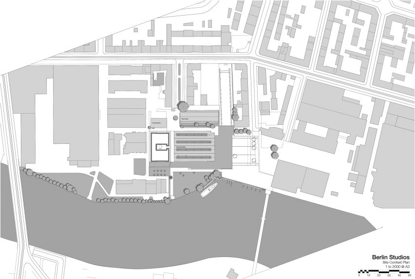 British firm Feilden Clegg Bradley Studios worked alongside musician and photographer Bryan Adams to transform a disused factory in southeast Berlin into a mixed-use development housing a cluster of creative studios.
