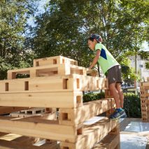 A child climbing Stackable Playscapes