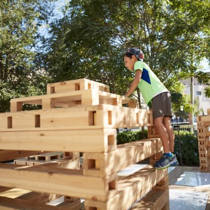 A child climbing Stackable Playscapes
