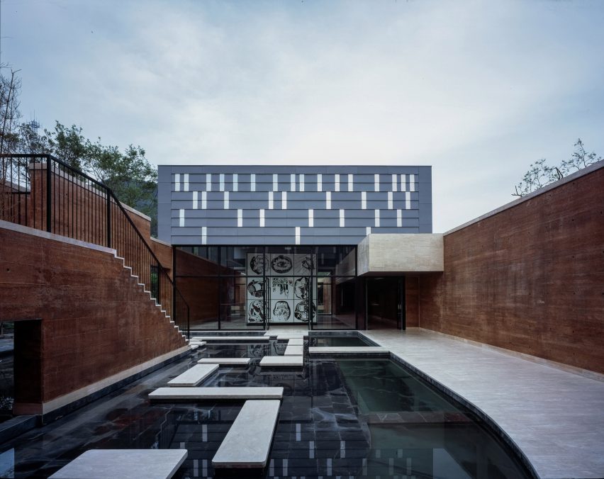 DL Atelier completes Chinese museum featuring rammed-earth walls and reflecting pools