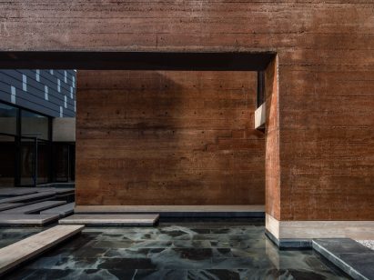 DL Atelier completes Chinese museum featuring rammed-earth walls and reflecting pools