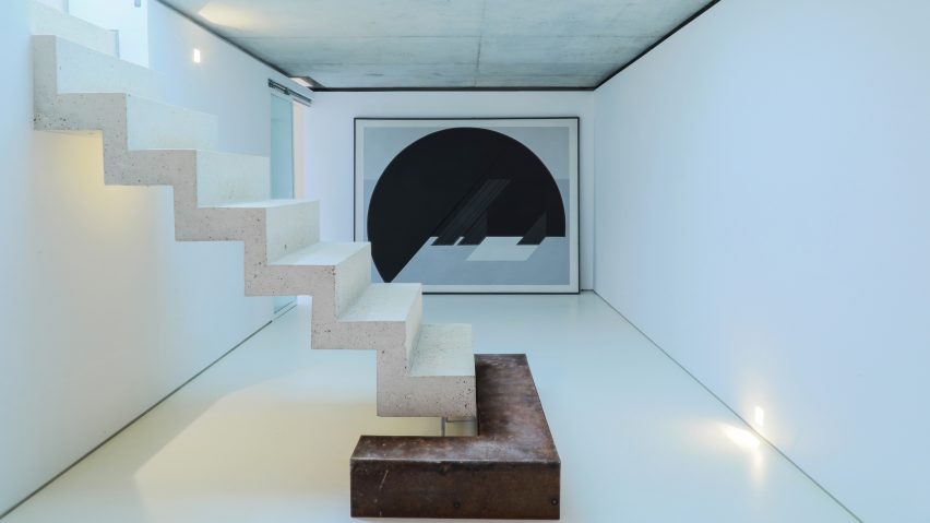 Checa Romero Architects “makes the most” of small brick house by extending in every direction
