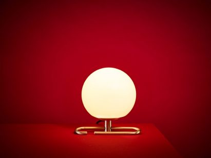 Neri&Hu's lantern-inspired lights sit on or hang from adjustable brass rings